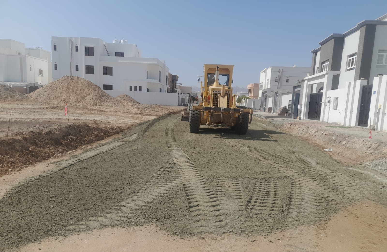Rollers compacting internal roads at Bahla industrial area